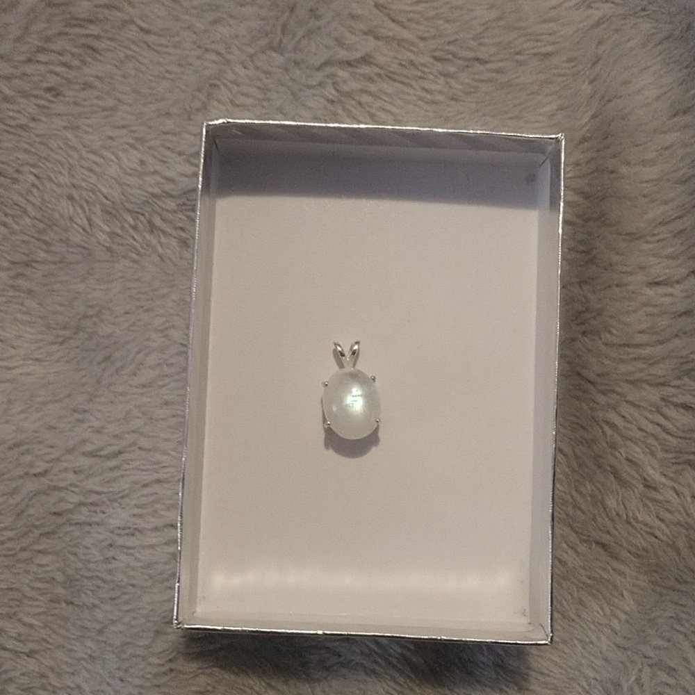 Real, raw moonstone pendant.